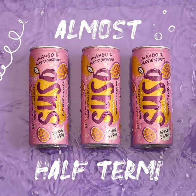 x3 mango and passionfruit suso cans on purple background