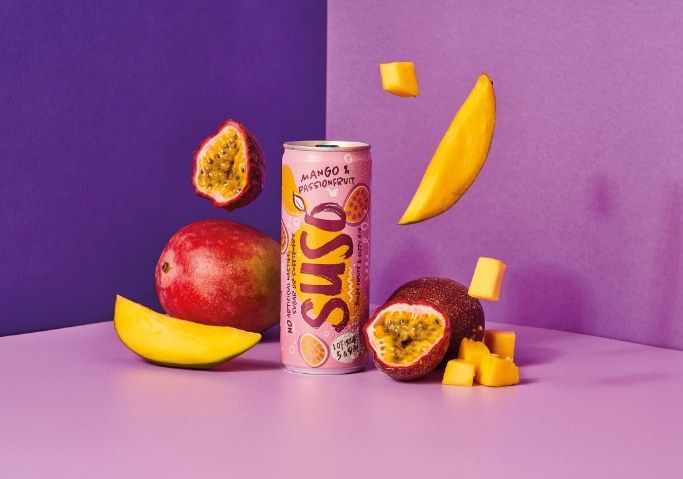 Mango & Passionfruit product shot with a purple background